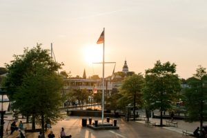 Navy and blush pink wedding celebration details during a sunset cruise on the Chesapeake Bay in Annapolis, Maryland.